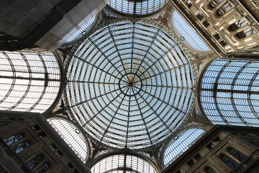 Naples, Italy, about 12/2017. Galleria Umberto in Naples. On the ground floor it is populated by numerous and luxurious shops. The ceiling is made with a large and spectacular window.