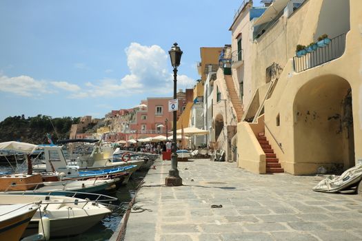 Procida island, Naples, Italy, About the July 2019. Procida Island near Naples. Port of Corricella frequented by fishermen. Typical colorful Mediterranean style houses and fishing boats in the harbor.