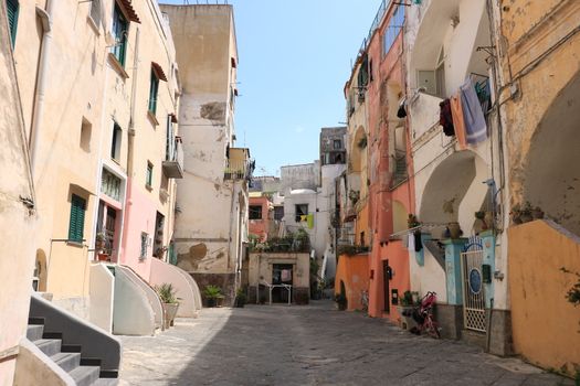 Procida, Naples, Italy, About the July 2019. Characteristic Mediterranean-style courtyard with colorful houses. 
