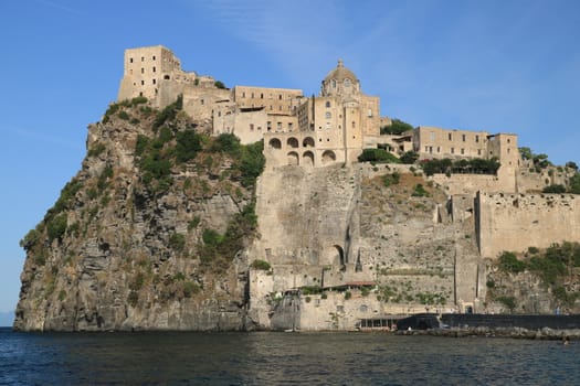 Ancient Aragonese Castle in Ischia Ponte. The fortification stands on a peninsula of volcanic rock connected to the village of Ponte. Ischia, Naples, Italy. 