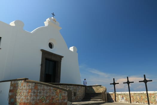 Church of Soccorso in Forio on the island of Ischia near Naples. Example of typical Mediterranean architecture rises above the sea.