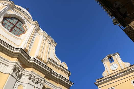 Ischia, Naples, Italy, About the July 2019. Museum of the sea and church in the small Mediterranean village of Ischia Ponte. Blue sky background.