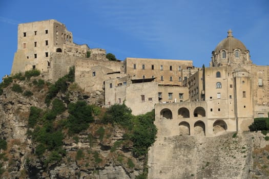 Ancient Aragonese Castle in Ischia Ponte. The fortification stands on a peninsula of volcanic rock connected to the village of Ponte. Ischia, Naples, Italy. 