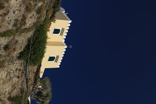 Ischia, Naples, Italy, About the July 2019. Mediterranean village on the island of Ischia. Near Sant'Angelo. The houses are built on volcanic rocks.