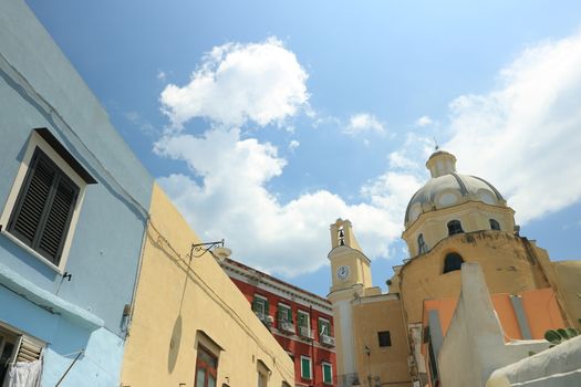 Village of Marina Corricella, Procida Island, Mediterranean Sea, near Naples. Church and the characteristic houses with colored facades.