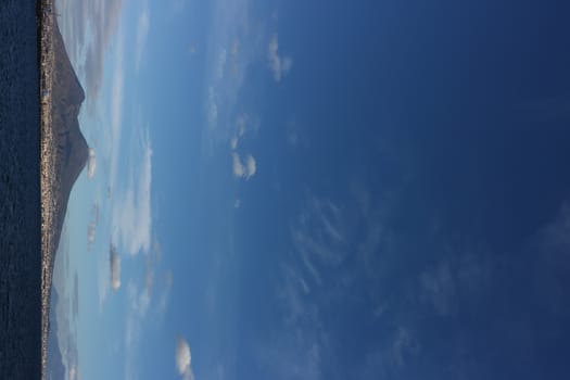 Panorama of the Gulf of Naples with the sea and the volcanic mountain of Vesuvius.