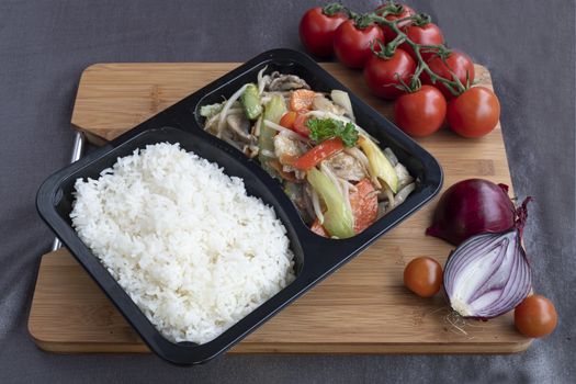 Stir fried chicken served with several type of vegetables as side dish for Chinese meals