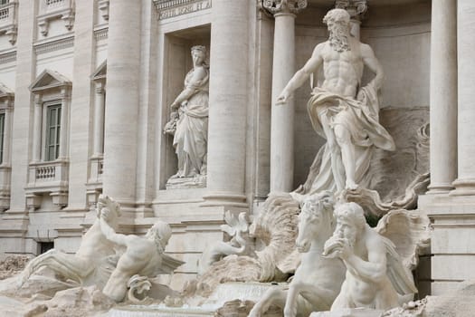 Rome, Italy, About 02/2017. Trevi Fountain with baroque sculptures in travertine marble.