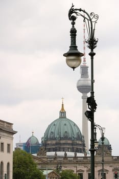 Symbols of Berlin. The sphericity of the television tower, street lamps and domes