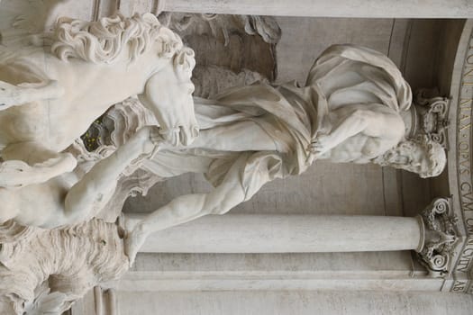 Trevi Fountain with baroque sculptures in travertine marble. Rome, Italy