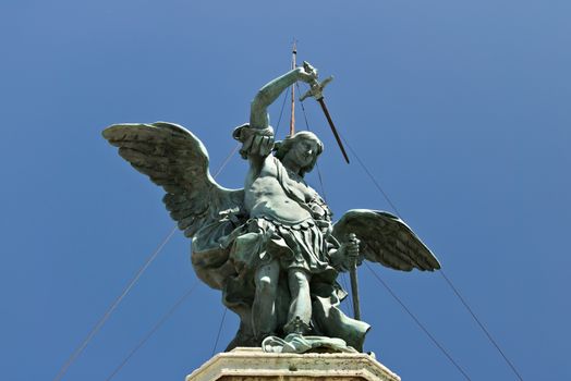 Rome, Italy. 05/02/2019. Angel statue with sword on the background of blue sky.