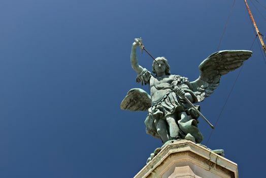 Rome, Italy. 05/02/2019. Angel statue with sword on the background of blue sky.