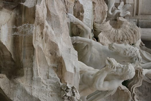 Rome, Italy, About 02/2017. Trevi Fountain with baroque sculptures in travertine marble.