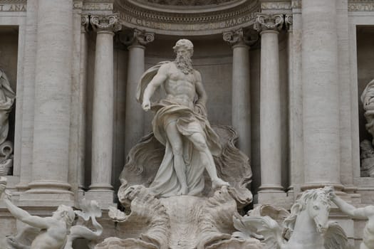 Trevi Fountain with baroque sculptures in travertine marble. Rome, Italy