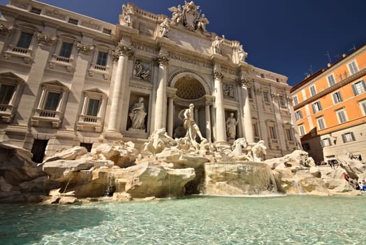 Trevi Fountain in Rome with the sculpture of Neptune. Rome Italy. 05/02/2019. The complex of the fountain built in the Baroque period is built in travertine marble.