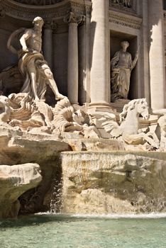 Trevi Fountain in Rome with the sculpture of Neptune. Rome Italy. 05/02/2019. The complex of the fountain built in the Baroque period is built in travertine marble.