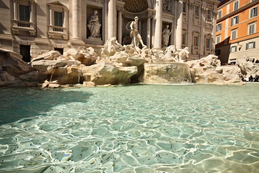 Trevi Fountain in Rome with the sculpture of Neptune. Rome Italy. 05/02/2019. The complex of the fountain built in the Baroque period is built in travertine marble.