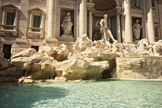 Trevi Fountain in Rome with the sculpture of Neptune. Rome Italy. 05/02/2019. The complex of the fountain built in the Baroque period is built in travertine marble.