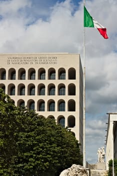 Palace of Italian Civilization built in Rome EUR. Fendi exhibition. Rome Eur, Italy. 05/03/2019. Entirely covered in travertine marble, inspired by the arches of the colosseum. View with the surrounding buildings.