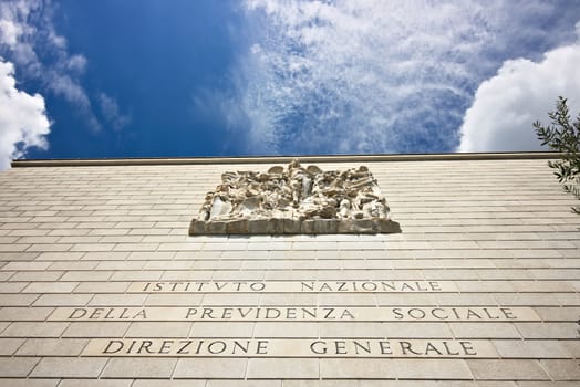 Palace of the INPS in Rome Eur. Rome Eur, Italy. 05/03/2019.  Headquarters building of the italian National Social Security Institute. Facade cladding in white Carrara marble.