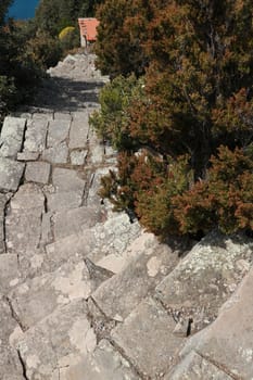 Steep stairway of a path that leads to the village of Monesteroli near the Cinque Terre.