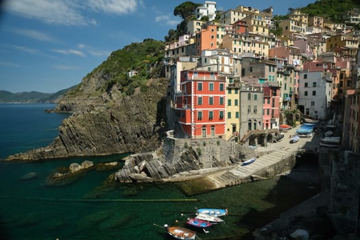Riomaggiore to the Cinque Terre. Colored houses on the sea. Famous tourist destination. Coronavirus period. Royalty Free Stock Photos.