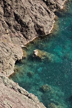 The sea coast of the Five Lands with rock walls and rocks