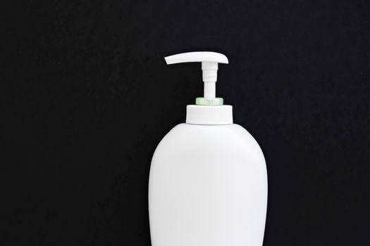 Blank label cosmetic container bottle as product mockup on black background, hygiene and healthcare