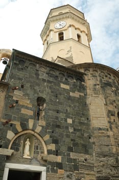 Vernazza, Cinque Terre, Liguria, Italy. Church and bell tower in the seaside village.