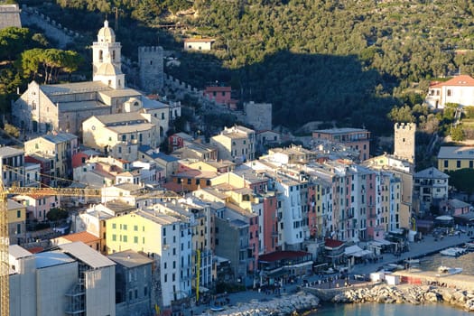 Portovenere, Liguria, Italy. About 10/ 2019. Portovenere, near the Cinque Terre in the light of sunset. Colorful houses, the church, with walls.