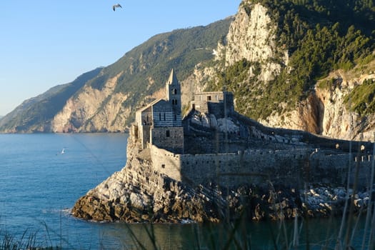 Church of San Pietro in Portovenere on the rocks overlooking the sea. Ancient medieval building near the Cinque Terre in Liguri. Italy.