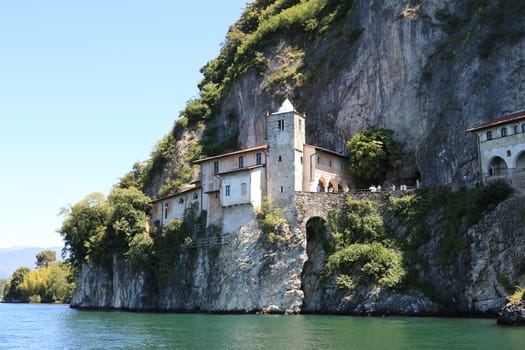 Lake Maggiore, Lombardy, Italy. about June 2019. Hermitage of Santa Caterina del Sasso overlooking Lake Maggiore.