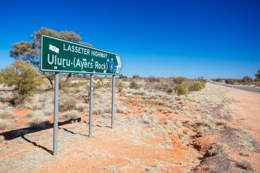 Erldunda, Australia - July 2: Road sign directing towards Uluru from the Stuart Hwy in the Northern Territory, Australia on July 2015
