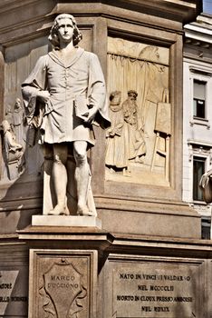 Marco D'Oggiono assistant to Leonardo. Statue in Piazza della Scala in Milan dedicated to Leonardo da Vinci. A white marble statue dedicated to the painter, Italian architect inventor who lived many years in Milan.