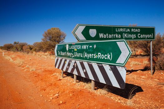 Erldunda, Australia - July 2 2015: Road sign directing towards Uluru and Kings Canyon in the Northern Territory, Australia