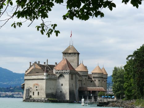 On a shore of Lake Geneva, there is this magnificent castle whose origins date back to the Middle Ages.