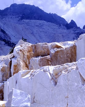 In the foreground excavation of marble from the quarries of Carrara Fantiscritti