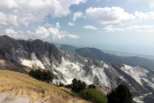 The white parts of the mountain highlight the areas of stone extraction.