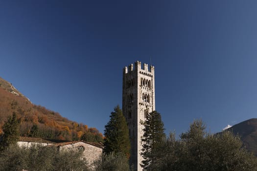 The church was built in medieval times. The walls are made of white marble blocks.