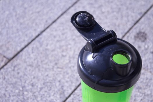 Transparent yellow shaker for sports drinks