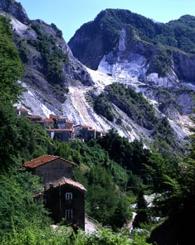 In the background the marble quarries on the Apuan Alps. (Tuscany, Italy).  Location famous for the production of Lardo di Colonnata. 