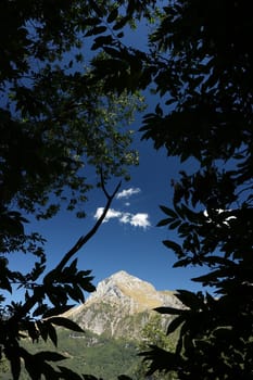 The mountain with a blue sky seen from the path number 6 which leads to Foce di Petrosciana.