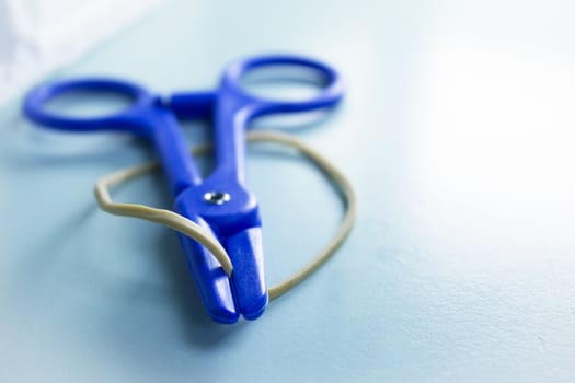 Plastic scissors. Used for blood tests.