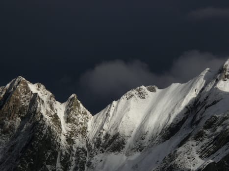 The white marble quarries are camouflaged with the white of the snow. Passo del Vestito (Lucca)