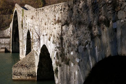 The bridge joins the two banks of the Serchio river and was built in medieval times.