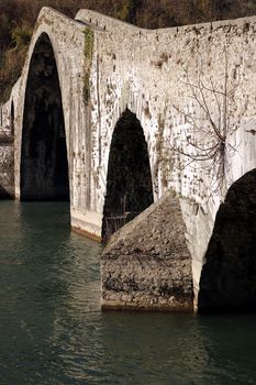 The bridge joins the two banks of the Serchio river and was built in medieval times.