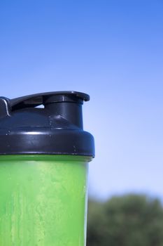 Transparent yellow shaker for sports drinks