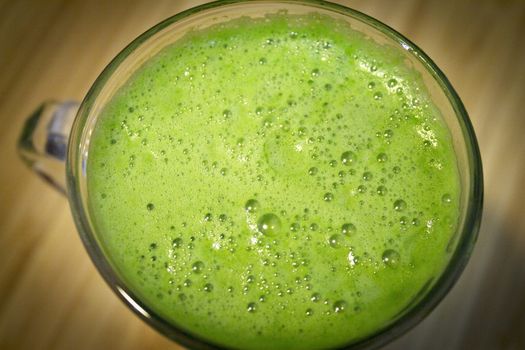 Green celery juice detoxifying drink. Vegan drink