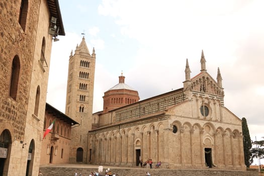 Massa Marittima, Maremma, Tuscany, Italy. About september 2019. Cathedral of San Cerbone and the bell tower of Massa Marittima. The church located in Piazza Garibaldi is in Romanesque and Gothic style.
