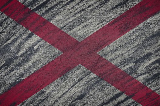 Close-up of national Alabama state flag painted with colored chalk on a blackboard.